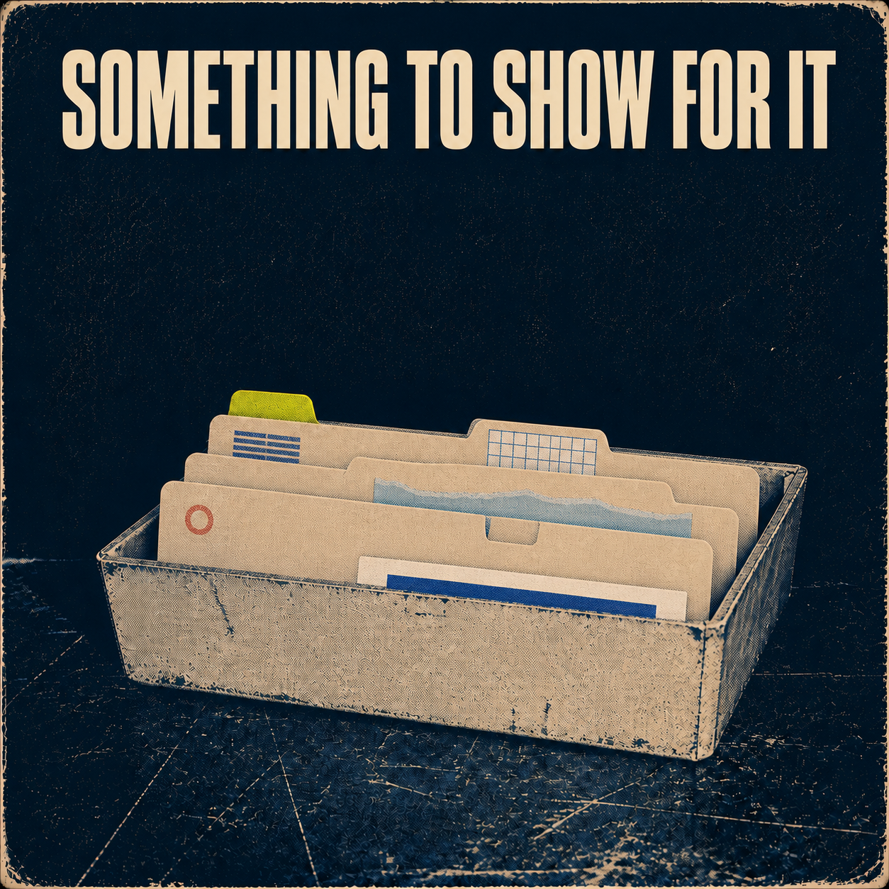 Six paper folders in a worn office tray beneath the title Something to Show for It